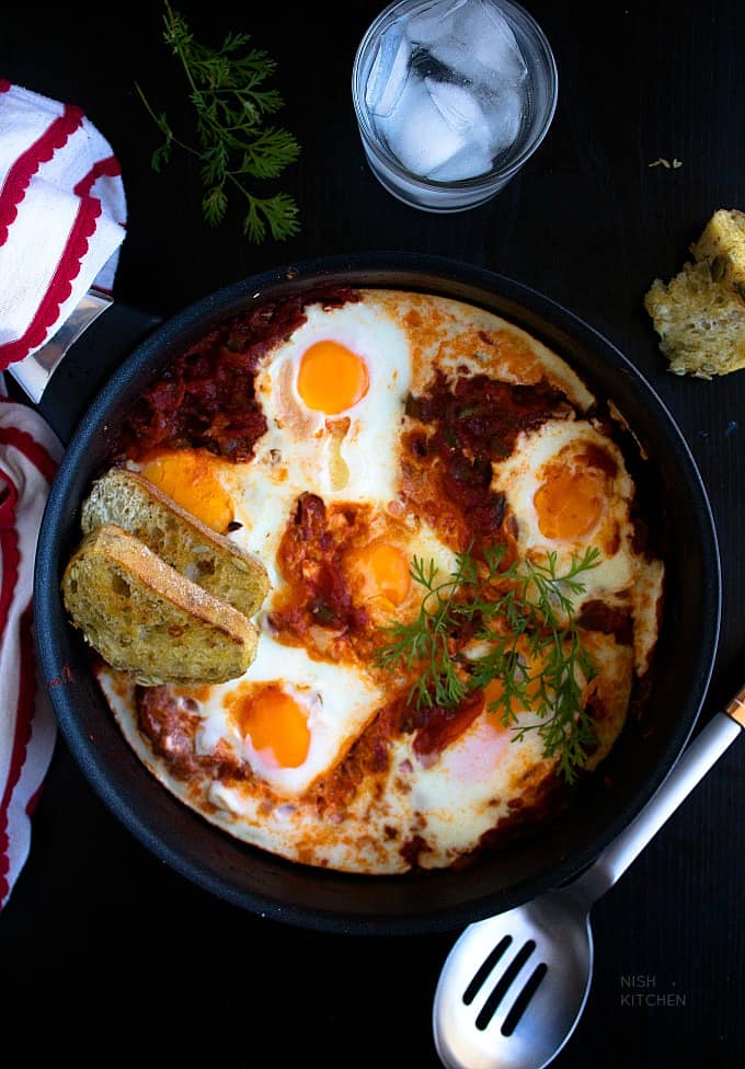 shakshuka poached eggs in spicy tomato sauce recipe video