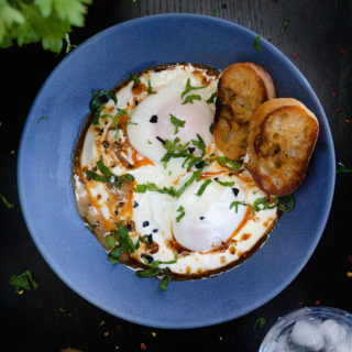 Turkish Eggs | Cilbir | Video - NISH KITCHEN